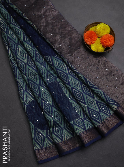 Chanderi silk cotton saree teal green and navy blue with allover ikat prints & mirror work and banarasi border