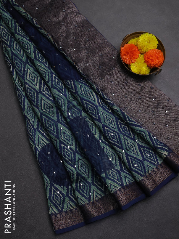 Chanderi silk cotton saree teal green and navy blue with allover ikat prints & mirror work and banarasi border