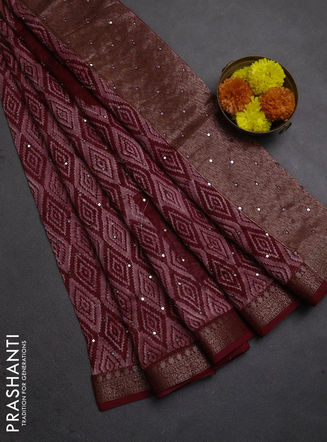 Chanderi silk cotton saree pastel maroon and maroon with allover ikat prints & mirror work and banarasi border