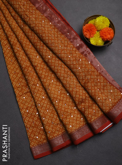 Chanderi silk cotton saree mustard yellow with allover butta prints & mirror work and banarasi border