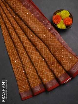 Chanderi silk cotton saree mustard yellow with allover butta prints & mirror work and banarasi border
