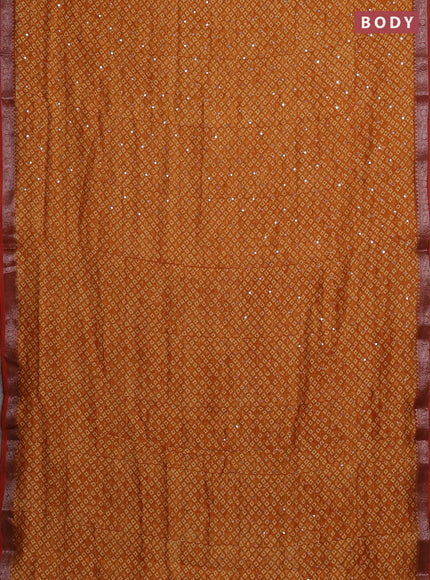 Chanderi silk cotton saree mustard yellow with allover butta prints & mirror work and banarasi border
