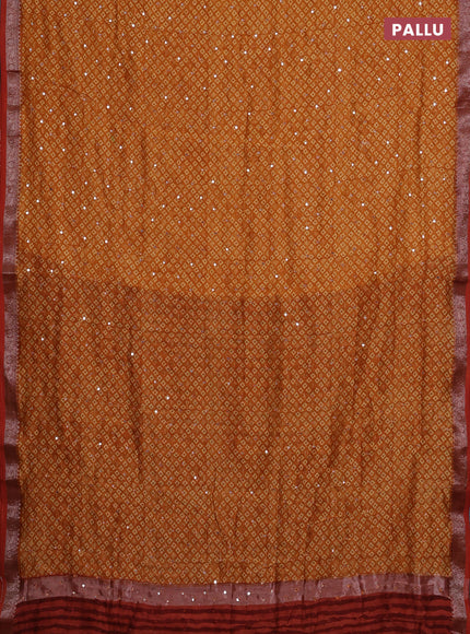 Chanderi silk cotton saree mustard yellow with allover butta prints & mirror work and banarasi border