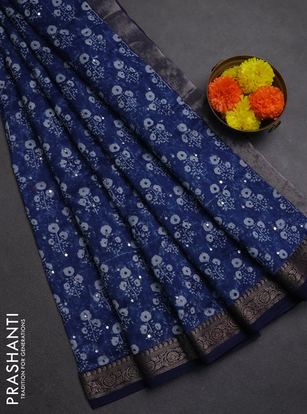 Chanderi silk cotton saree indigo blue with allover floral butta prints & mirror work and banarasi border