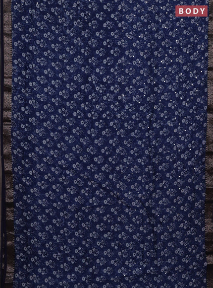 Chanderi silk cotton saree indigo blue with allover floral butta prints & mirror work and banarasi border