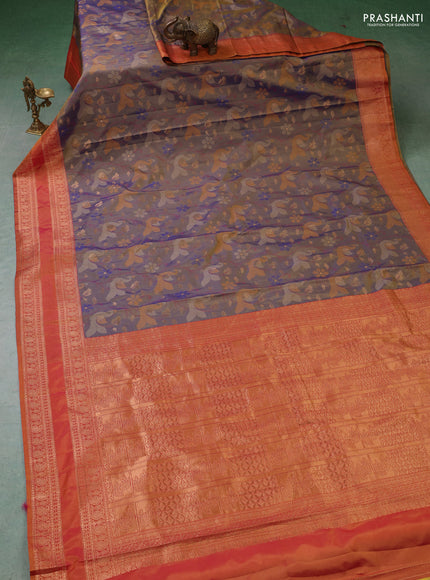 Semi kanchipuram soft silk saree dual shade of bluish green and rust shade with allover thread & zari woven buttas and rettapet zari woven border
