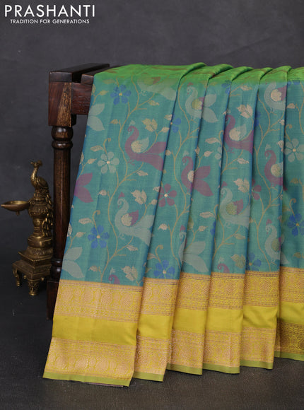 Semi kanchipuram soft silk saree dual shade of bluish green and mustard green with allover thread & zari woven buttas and rettapet zari woven border