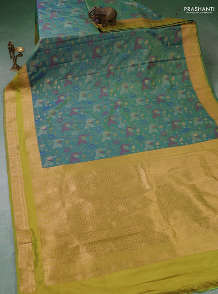 Semi kanchipuram soft silk saree dual shade of bluish green and mustard green with allover thread & zari woven buttas and rettapet zari woven border
