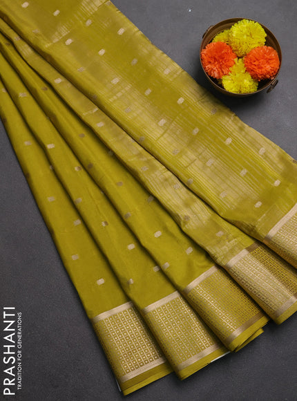 Semi mysore silk saree lime green with allover zari woven buttas and zari woven border