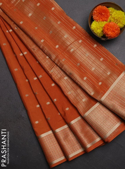 Semi mysore silk saree rust shade with allover zari woven buttas and zari woven border