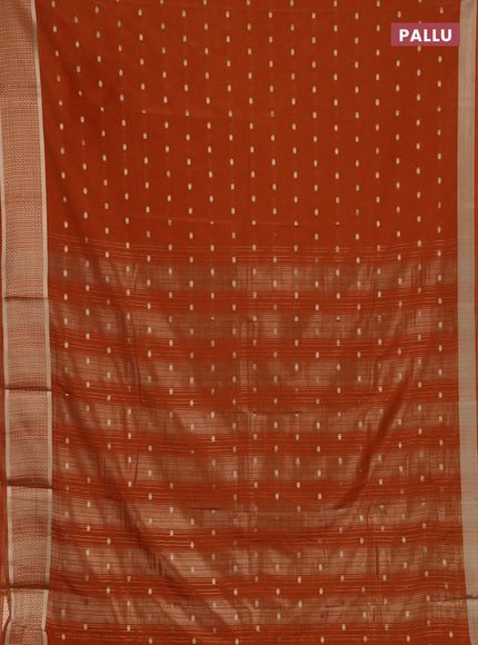 Semi mysore silk saree rust shade with allover zari woven buttas and zari woven border
