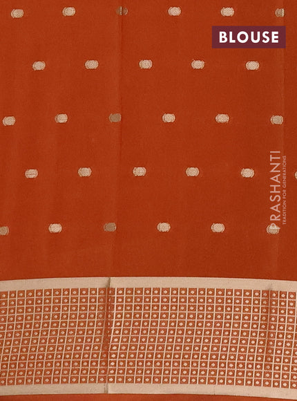 Semi mysore silk saree rust shade with allover zari woven buttas and zari woven border