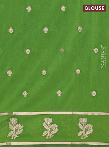 Semi mysore silk saree light green with zari woven buttas and rettapet zari woven butta border