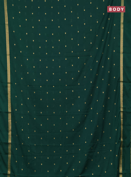 Semi mysore silk saree green with allover paisley butta prints and rettapet zari woven border