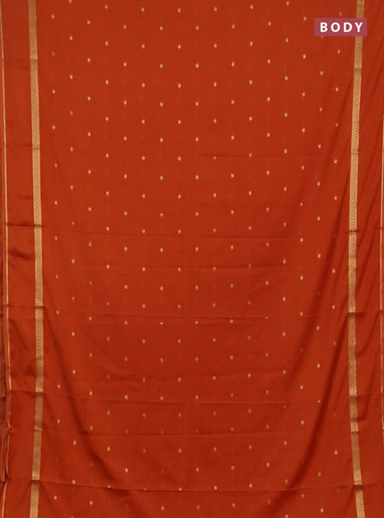 Semi mysore silk saree rustic orange with allover paisley butta prints and rettapet zari woven border