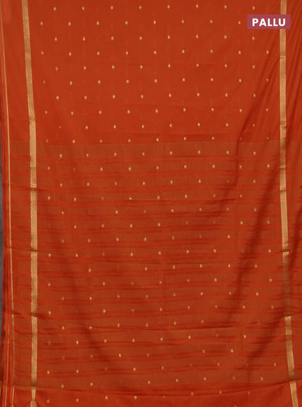 Semi mysore silk saree rustic orange with allover paisley butta prints and rettapet zari woven border