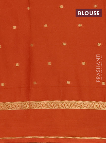 Semi mysore silk saree rustic orange with allover paisley butta prints and rettapet zari woven border