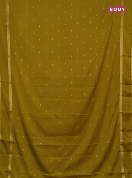 Semi mysore silk saree mustard green with allover paisley butta prints and rettapet zari woven border