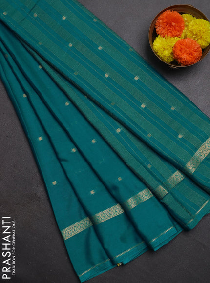 Semi mysore silk saree teal blue shade with allover paisley butta prints and rettapet zari woven border