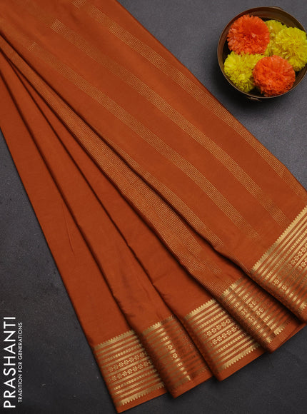 Semi mysore silk saree rustic orange with plain body and zari woven border