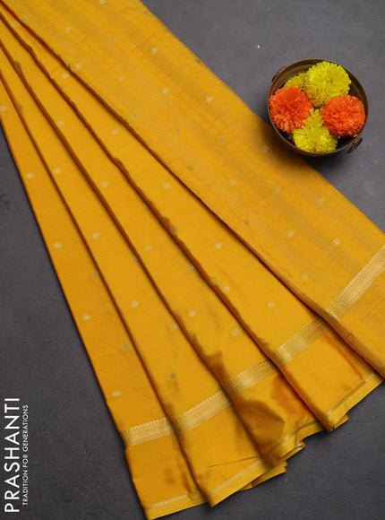 Semi mysore silk saree mustard yellow with allover zari woven buttas and rettapet zari woven border