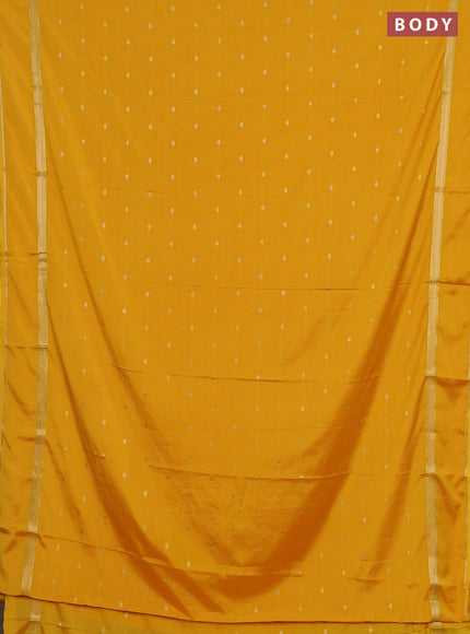Semi mysore silk saree mustard yellow with allover zari woven buttas and rettapet zari woven border