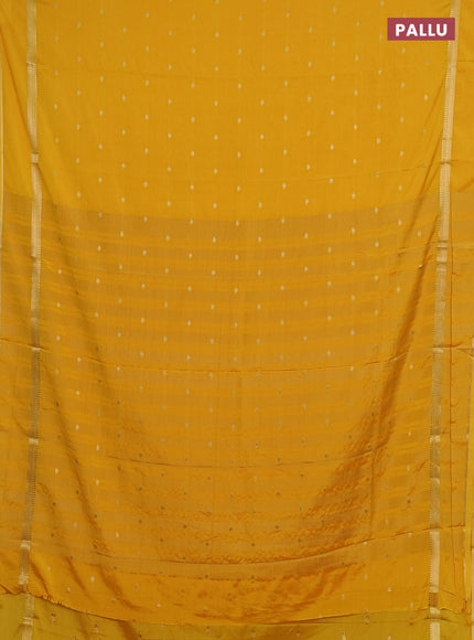 Semi mysore silk saree mustard yellow with allover zari woven buttas and rettapet zari woven border