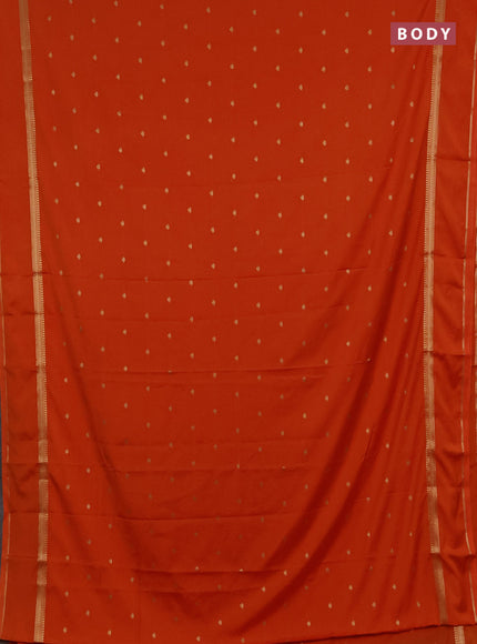 Semi mysore silk saree orange with allover zari woven buttas and rettapet zari woven border