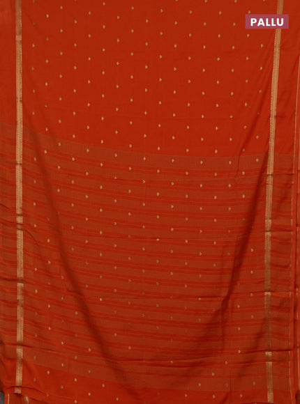 Semi mysore silk saree orange with allover zari woven buttas and rettapet zari woven border