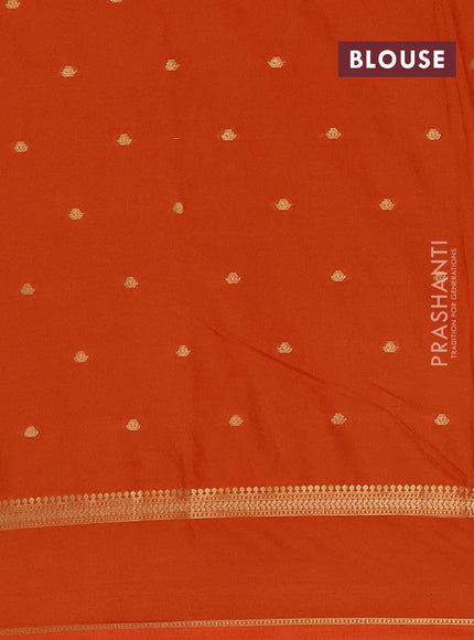 Semi mysore silk saree orange with allover zari woven buttas and rettapet zari woven border