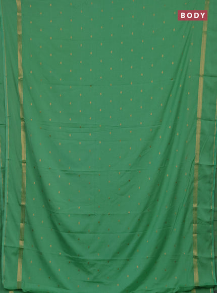 Semi mysore silk saree mild teal green with allover zari woven buttas and rettapet zari woven border