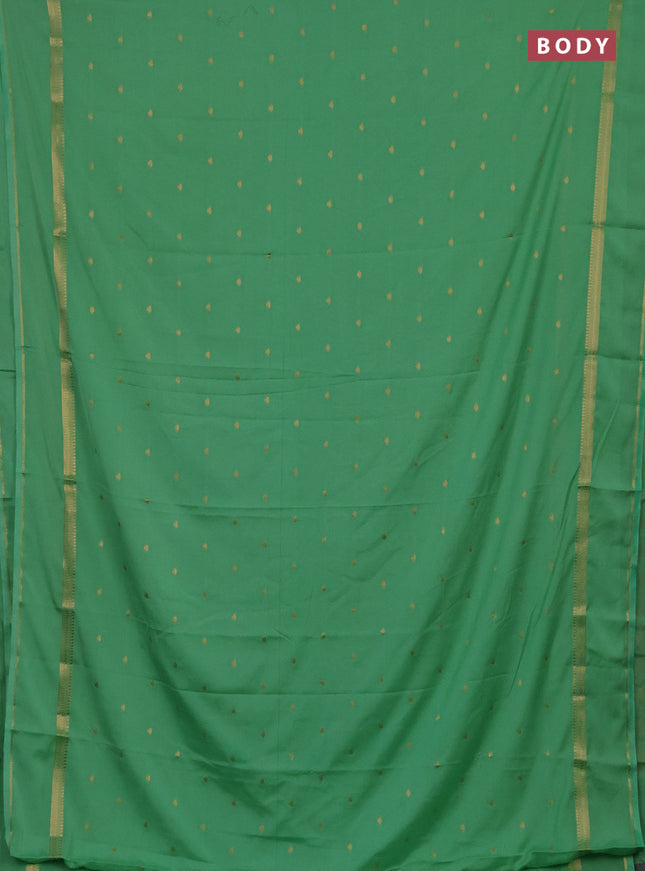 Semi mysore silk saree mild teal green with allover zari woven buttas and rettapet zari woven border