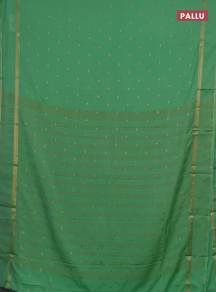 Semi mysore silk saree mild teal green with allover zari woven buttas and rettapet zari woven border