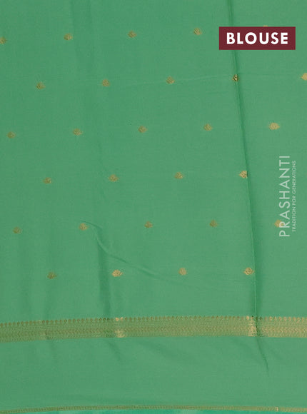 Semi mysore silk saree mild teal green with allover zari woven buttas and rettapet zari woven border