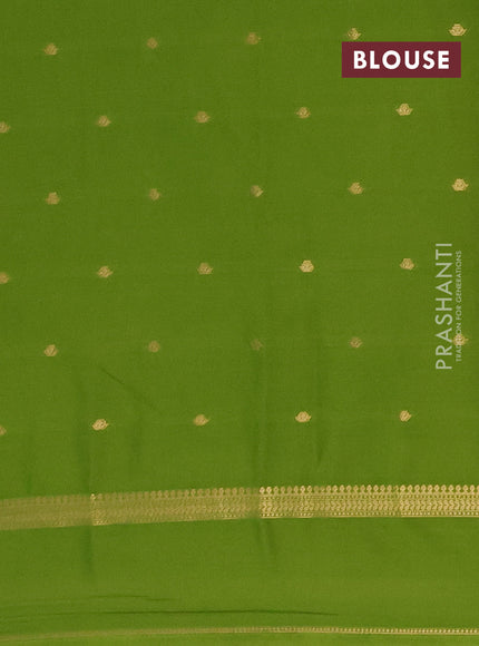 Semi mysore silk saree light green with allover zari woven buttas and rettapet zari woven border