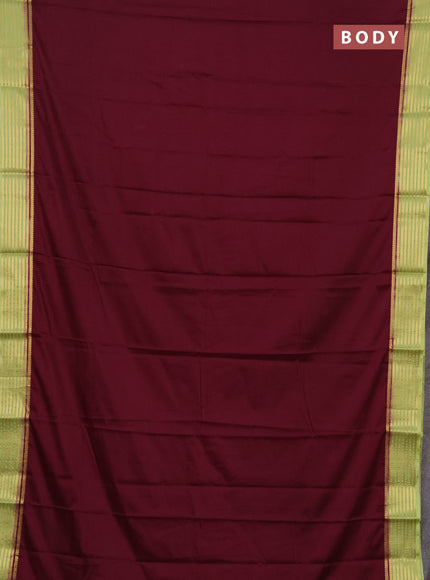 Semi mysore silk saree wine shade and light green with plain body and zari woven border