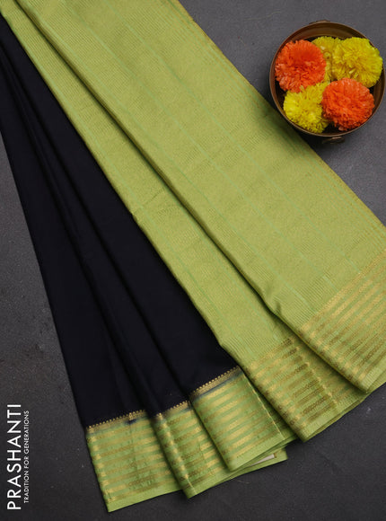 Semi mysore silk saree black and light green with plain body and zari woven border