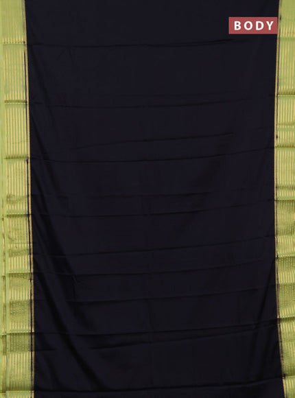 Semi mysore silk saree black and light green with plain body and zari woven border