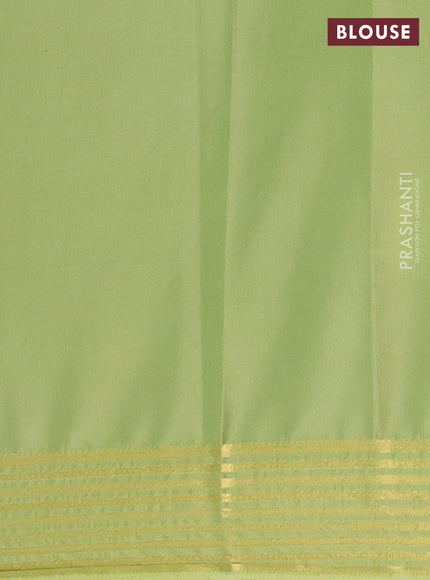 Semi mysore silk saree black and light green with plain body and zari woven border