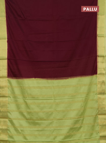 Semi mysore silk saree wine shade and light green with plain body and zari woven border