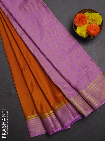 Semi mysore silk saree dark mustard and lavender with plain body and zari woven border