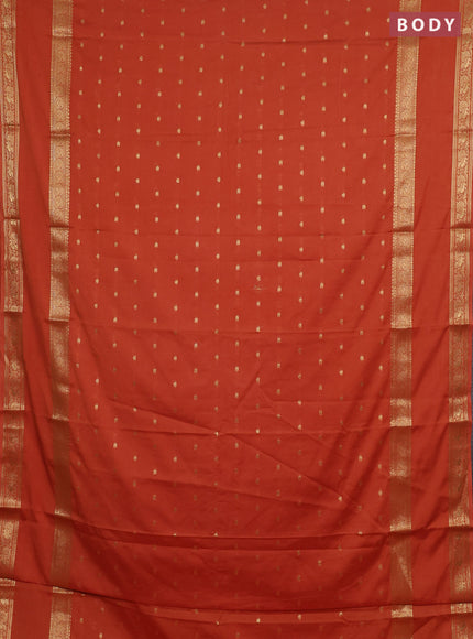Semi mysore silk saree rustic orange with allover zari woven buttas and rettapet zari woven border