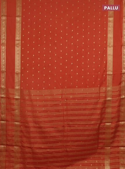 Semi mysore silk saree rustic orange with allover zari woven buttas and rettapet zari woven border