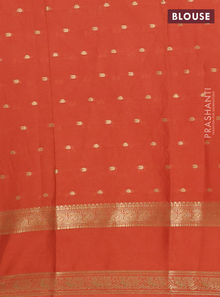 Semi mysore silk saree rustic orange with allover zari woven buttas and rettapet zari woven border