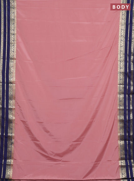 Semi mysore silk saree peach pink shade and navy blue with plain body and zari woven border
