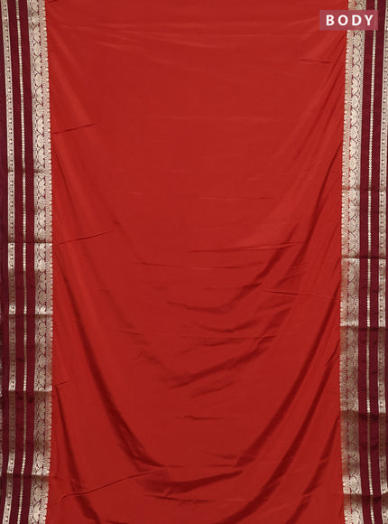 Semi mysore silk saree rustic orange and brown with plain body and zari woven border