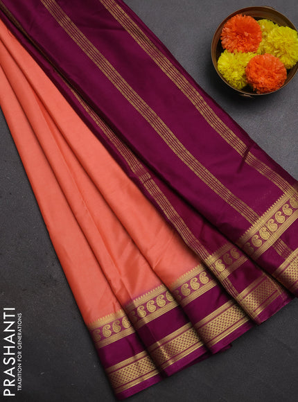 Semi mysore silk saree peach shade and purple with plain body and rettapet zari woven border