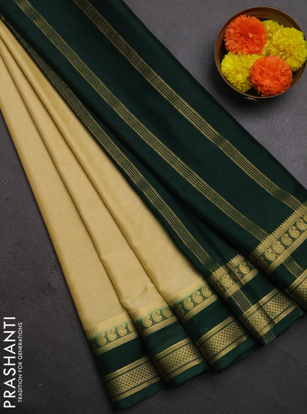 Semi mysore silk saree cream and bottle green with plain body and rettapet zari woven border