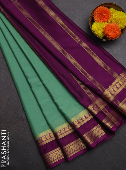Semi mysore silk saree pastel green and purple with plain body and rettapet zari woven border