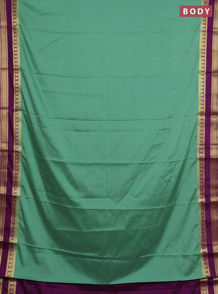 Semi mysore silk saree pastel green and purple with plain body and rettapet zari woven border